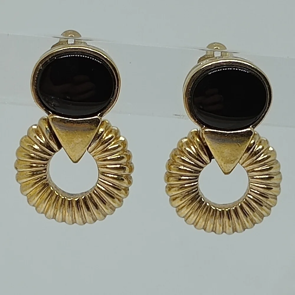 * vintage Panetta black and gold tone clip on earrings